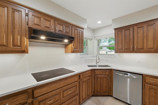 5518 Oak Branch Dr, Arlington, TX 76016 - kitchen with stainless steel dishwasher, black electric stovetop, under cabinet range hood, a sink, and decorative backsplash