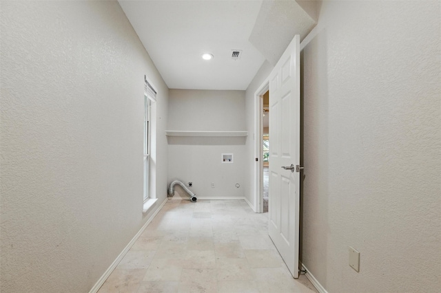 5518 Oak Branch Dr, Arlington, TX 76016 - laundry room featuring hookup for a gas dryer, washer hookup, a textured wall, hookup for an electric dryer, and baseboards