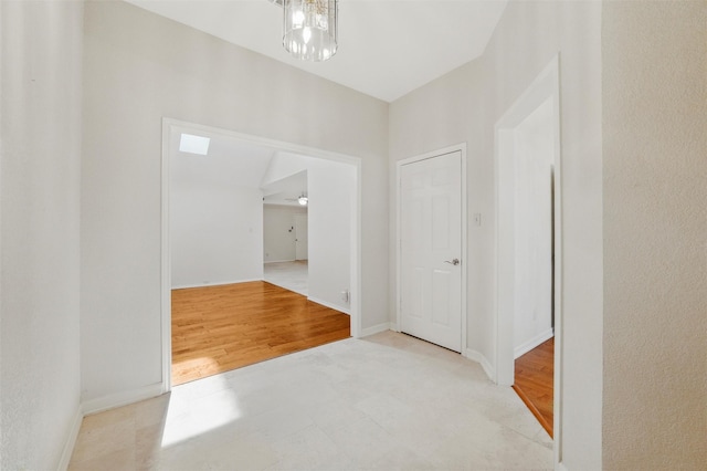 5518 Oak Branch Dr, Arlington, TX 76016 - hallway with baseboards and wood finished floors