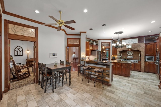 719 Morningside Dr, Mansfield, TX 76063 - dining space with ceiling fan, a chandelier, recessed lighting, and crown molding