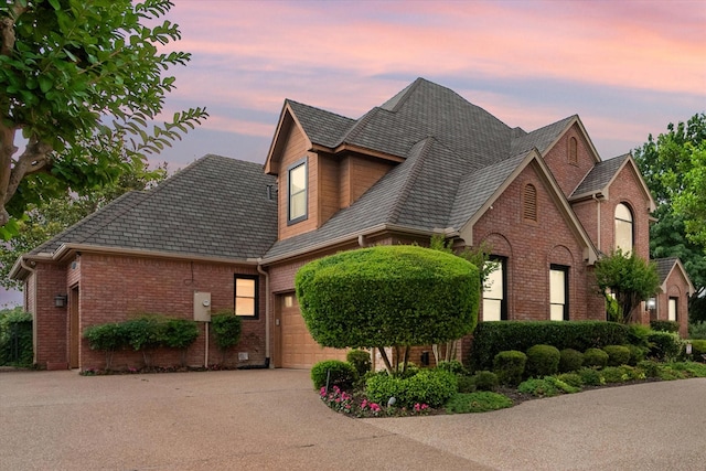 719 Morningside Dr, Mansfield, TX 76063 - view of front of property featuring driveway, brick siding, and an attached garage