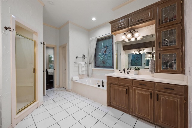 719 Morningside Dr, Mansfield, TX 76063 - bathroom with vanity, crown molding, a garden tub, a stall shower, and tile patterned flooring