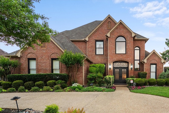 719 Morningside Dr, Mansfield, TX 76063 - view of front of property with french doors and brick siding