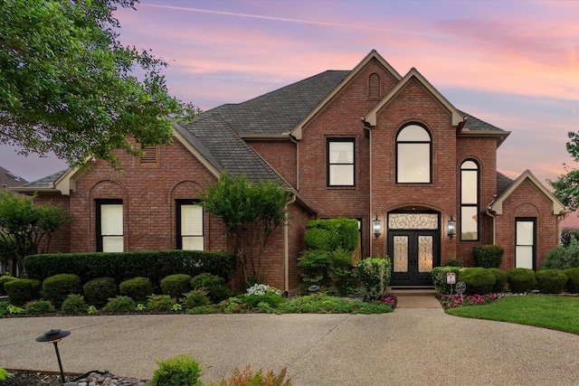 719 Morningside Dr, Mansfield, TX 76063 - view of front of home featuring french doors and brick siding