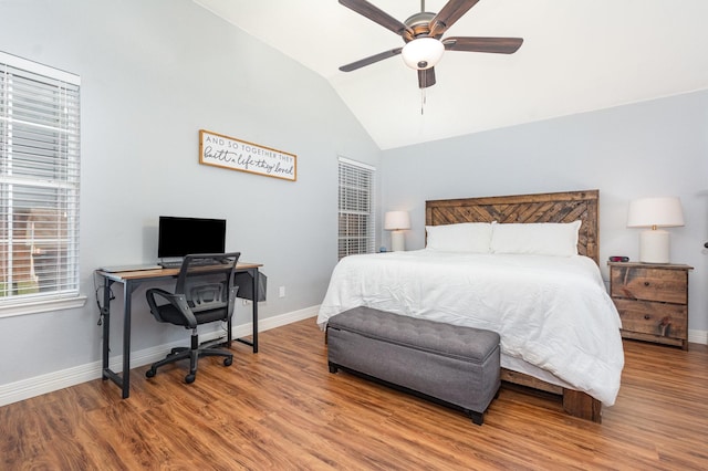 7037 Longo Dr, The Colony, TX 75056 - bedroom featuring vaulted ceiling, wood finished floors, baseboards, a desk, and a ceiling fan