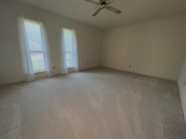 2621 Picadilly Ln, Denton, TX 76209 - spare room featuring light carpet and ceiling fan