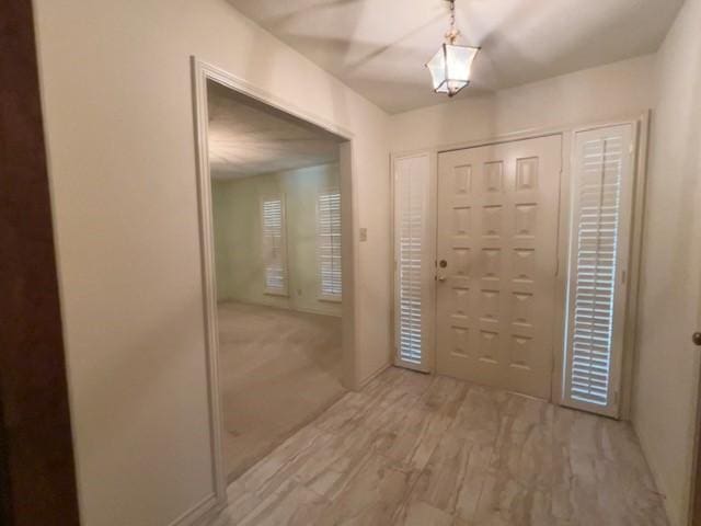 2621 Picadilly Ln, Denton, TX 76209 - foyer featuring wood finished floors