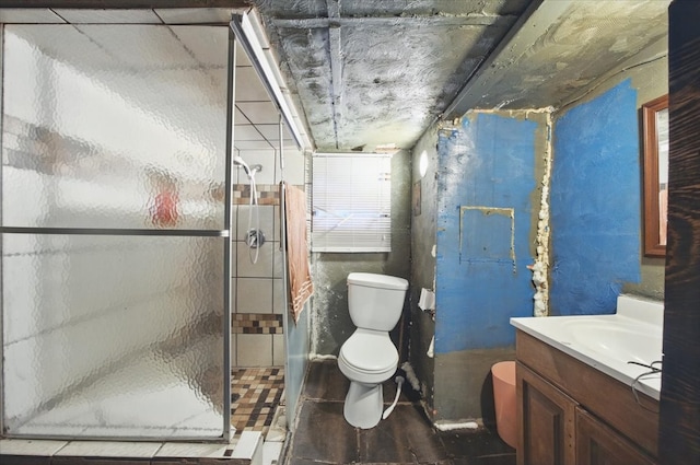 17128 County Road 3322, Frost, TX 76641 - bathroom featuring toilet, vanity, and a shower stall