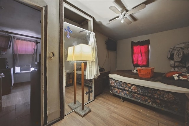 17128 County Road 3322, Frost, TX 76641 - bedroom with wood finished floors, lofted ceiling, and ceiling fan