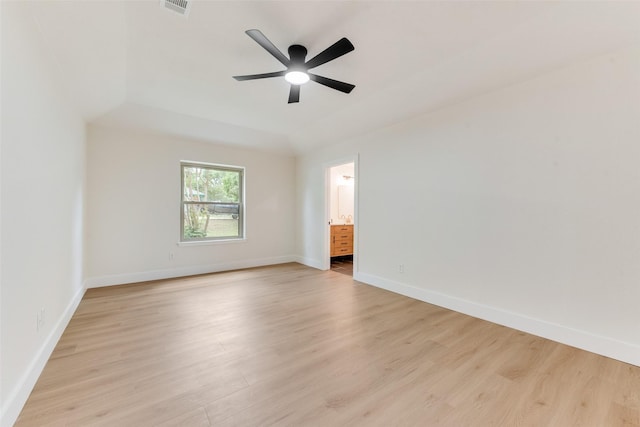 800 Shady Ln N, Keller, TX 76248 - spare room with light wood-style floors, ceiling fan, a tray ceiling, and baseboards