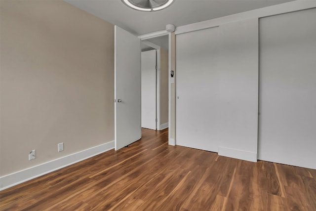 3883 Turtle Creek Blvd Unit 204, Dallas, TX 75219 - spare room featuring wood finished floors and baseboards