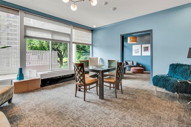 3883 Turtle Creek Blvd Unit 204, Dallas, TX 75219 - dining space featuring carpet flooring and a chandelier