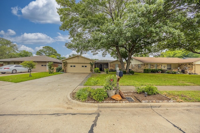 1808 Tameria Dr, Irving, TX 75060 - ranch-style home featuring driveway, stone siding, board and batten siding, a front lawn, and an attached garage