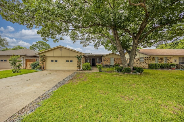 1808 Tameria Dr, Irving, TX 75060 - single story home featuring a garage, concrete driveway, a front yard, and board and batten siding