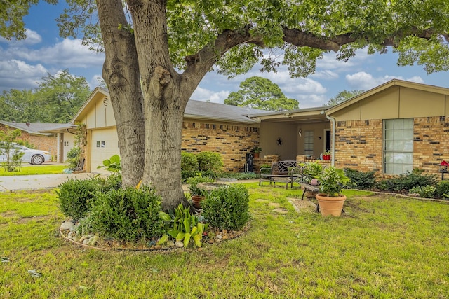 1808 Tameria Dr, Irving, TX 75060 - ranch-style house with brick siding, a garage, a front yard, and concrete driveway