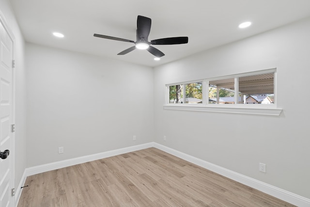 1409 Milner Rd, Irving, TX 75061 - unfurnished bedroom with wood finished floors, recessed lighting, baseboards, and ceiling fan