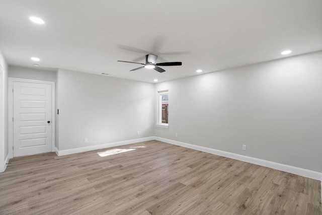 1409 Milner Rd, Irving, TX 75061 - unfurnished room with light wood-style floors, ceiling fan, recessed lighting, and baseboards