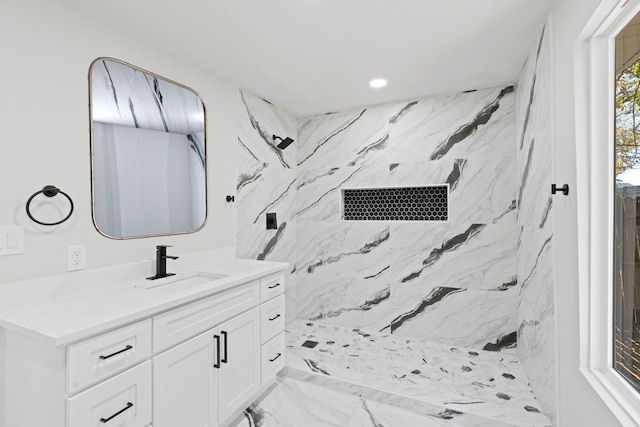 1409 Milner Rd, Irving, TX 75061 - bathroom featuring vanity, a marble finish shower, recessed lighting, and marble finish floors