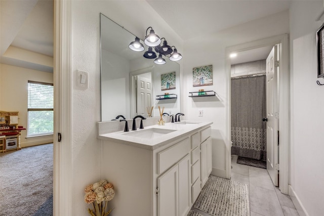 2208 Turtle Creek Dr, Sherman, TX 75092 - bathroom with double vanity, baseboards, curtained shower, and tile patterned floors