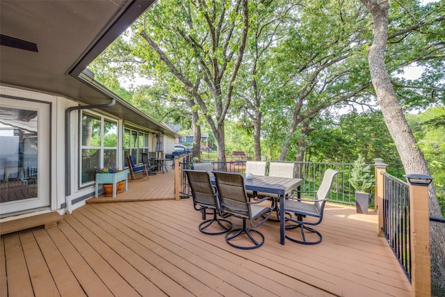 2208 Turtle Creek Dr, Sherman, TX 75092 - wooden deck featuring outdoor dining space and view of scattered trees