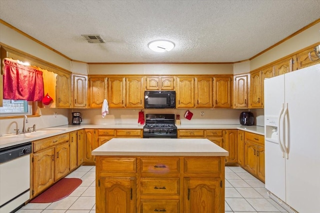 109 Hilltop St, Riesel, TX 76682 - kitchen with black appliances, light tile patterned floors, a sink, light countertops, and ornamental molding