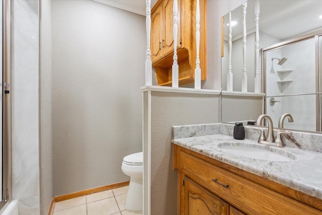 109 Hilltop St, Riesel, TX 76682 - bathroom with vanity, toilet, tile patterned flooring, and a shower with shower door