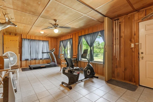 109 Hilltop St, Riesel, TX 76682 - exercise room featuring wooden walls, ceiling fan, and light tile patterned floors