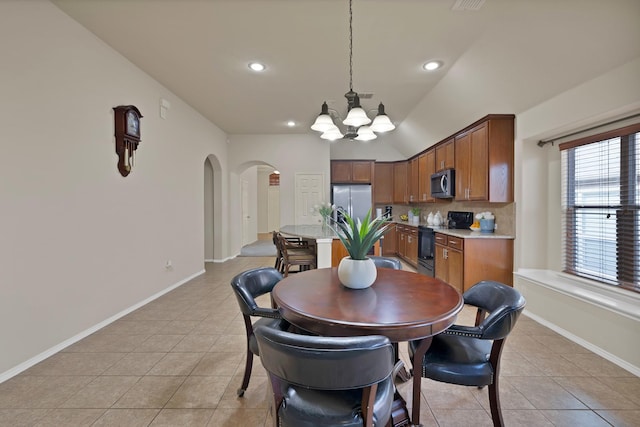 760 Red Elm Ln, Fort Worth, TX 76131 - dining area featuring arched walkways, a chandelier, light tile patterned flooring, baseboards, and recessed lighting