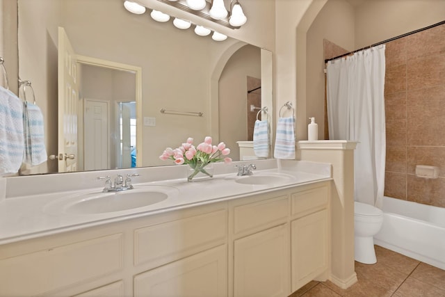 760 Red Elm Ln, Fort Worth, TX 76131 - full bathroom with double vanity, tile patterned flooring, toilet, and shower / bathtub combination with curtain