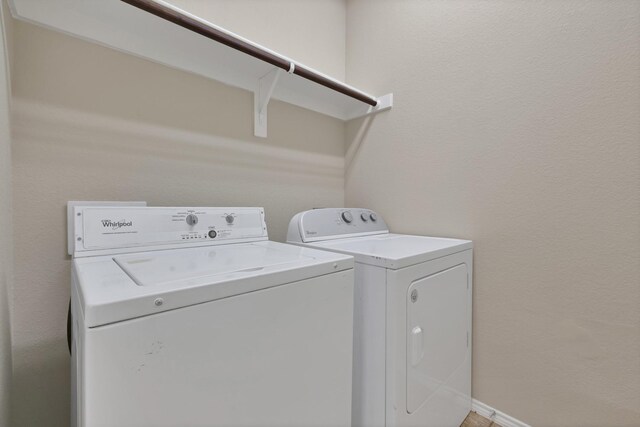 760 Red Elm Ln, Fort Worth, TX 76131 - laundry room featuring independent washer and dryer and baseboards