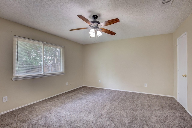 6729 Windwillow Dr, Fort Worth, TX 76137 - carpeted spare room featuring a ceiling fan, a textured ceiling, and baseboards