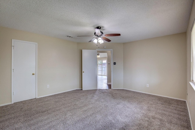 6729 Windwillow Dr, Fort Worth, TX 76137 - empty room featuring a ceiling fan, carpet flooring, a textured ceiling, and baseboards