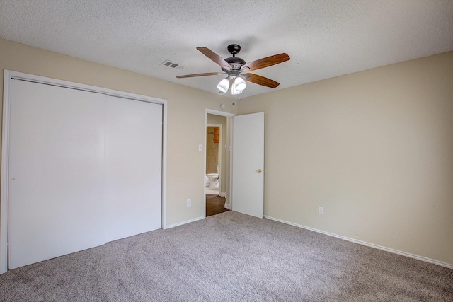 6729 Windwillow Dr, Fort Worth, TX 76137 - unfurnished bedroom with carpet flooring, a closet, ceiling fan, and a textured ceiling