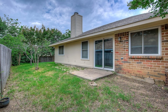 6729 Windwillow Dr, Fort Worth, TX 76137 - rear view of house with brick siding, a chimney, and roof with shingles