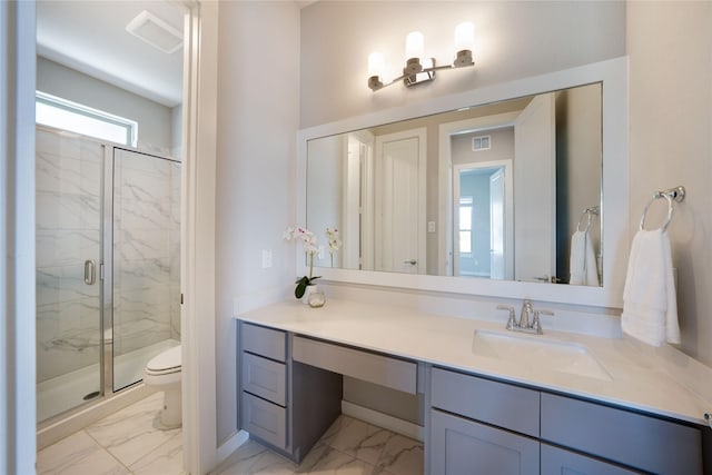3493 Hollow Pine Dr, Frisco, TX 75033 - bathroom featuring marble look tiles, toilet, a marble finish shower, vanity, and baseboards