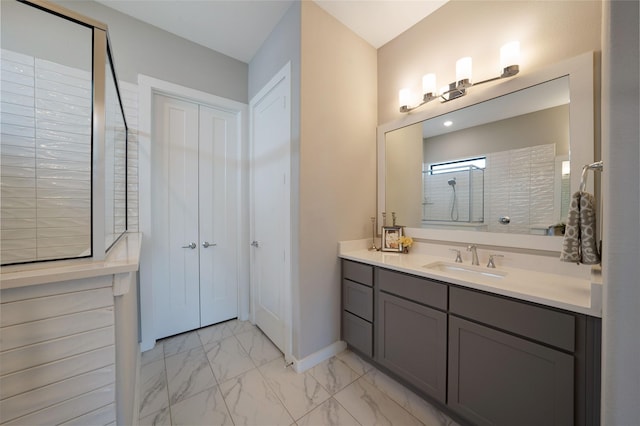 3493 Hollow Pine Dr, Frisco, TX 75033 - full bath with marble finish flooring, vanity, baseboards, and a shower