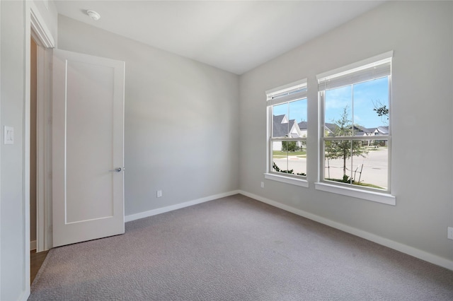 3493 Hollow Pine Dr, Frisco, TX 75033 - empty room featuring baseboards, carpet, and a smoke detector