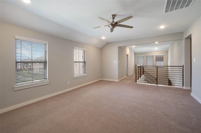 3493 Hollow Pine Dr, Frisco, TX 75033 - spare room with ceiling fan, baseboards, light colored carpet, recessed lighting, and vaulted ceiling