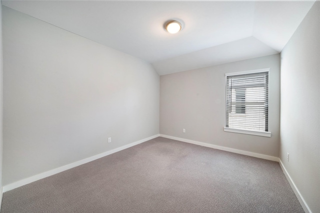 3493 Hollow Pine Dr, Frisco, TX 75033 - unfurnished room featuring vaulted ceiling, carpet floors, and baseboards