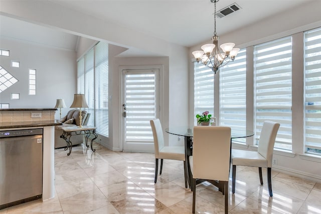 5916 Broadmoor Dr, Plano, TX 75093 - dining room with healthy amount of natural light, a chandelier, baseboards, and light marble finish floors