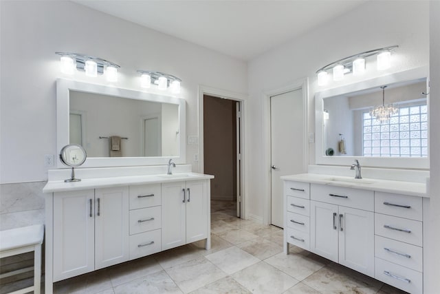 5916 Broadmoor Dr, Plano, TX 75093 - bathroom with vanity, a chandelier, and tile patterned floors