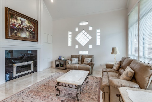 5916 Broadmoor Dr, Plano, TX 75093 - living room with a high ceiling, crown molding, light marble finish flooring, and plenty of natural light