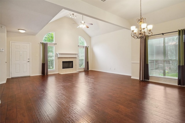 1535 Eagle Nest Pass, Lewisville, TX 75077 - unfurnished living room featuring a chandelier, wood-type flooring, a fireplace, ceiling fan, and high vaulted ceiling