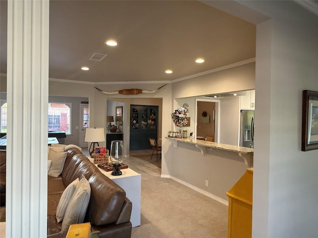 3417 Danbury Dr, Amarillo, TX 79109 - living area with recessed lighting, light carpet, crown molding, and baseboards