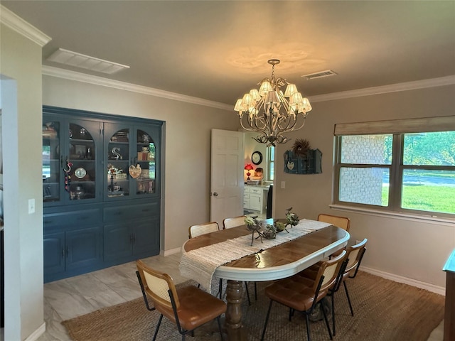 3417 Danbury Dr, Amarillo, TX 79109 - dining room with a chandelier, ornamental molding, and baseboards