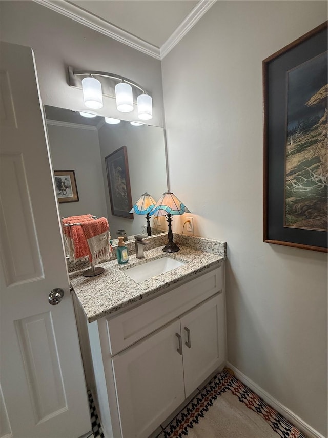 3417 Danbury Dr, Amarillo, TX 79109 - bathroom featuring vanity, ornamental molding, and baseboards