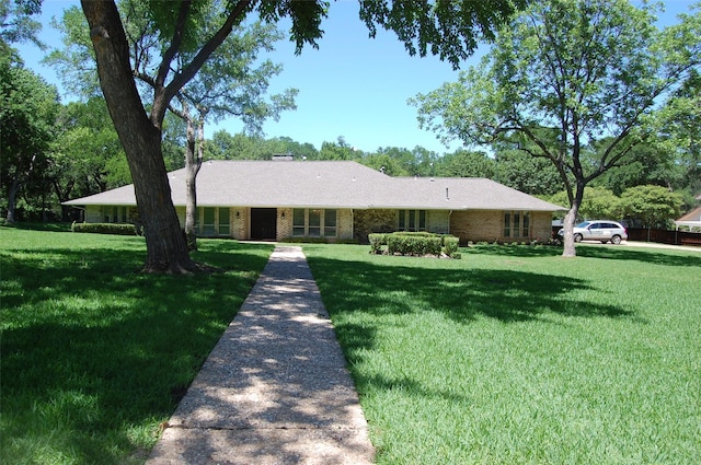1107 Rock Springs Rd, Duncanville, TX 75137 - single story home featuring a front yard and brick siding