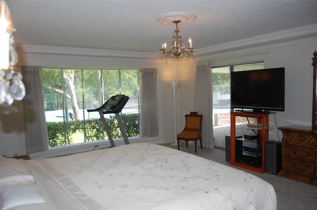 1107 Rock Springs Rd, Duncanville, TX 75137 - bedroom with a chandelier, a textured ceiling, carpet flooring, and ornamental molding
