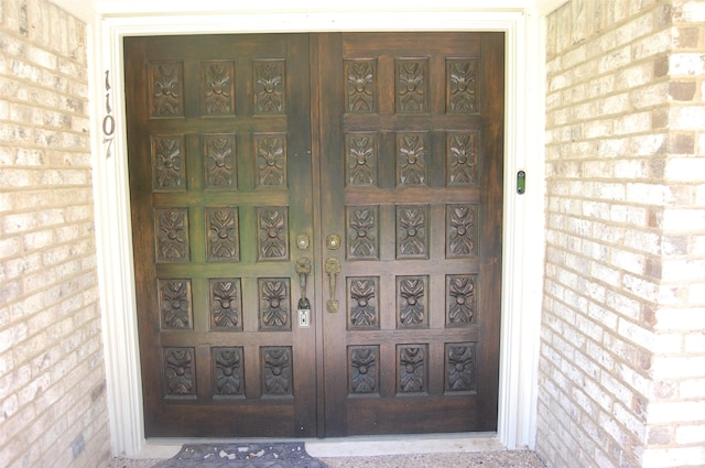 1107 Rock Springs Rd, Duncanville, TX 75137 - doorway to property featuring brick siding