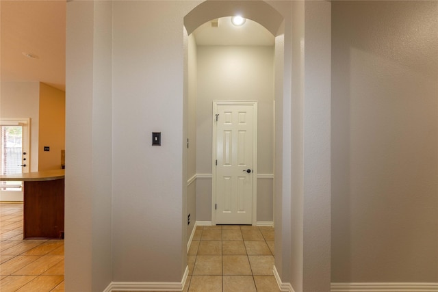 6506 Bunker Hill Ct, Rowlett, TX 75089 - corridor featuring arched walkways and light tile patterned floors